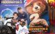 Patient Ben and brother Joshua in front of Paddington 2 poster