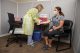 Paula Condy, RN, collects a blood sample from study participant Miriam Dillard Stroud.
