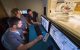 Radiation therapists Chance Taylor, Carla LaFosse and Andrew Saunders