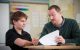 Patient Evans with teacher/school liaison Justin Gardner
