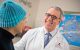 Victor Santana, MD, talks to a patient