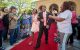 Patient Jacorrion and guest walk the red carpet at prom