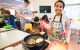 Marley Harris with cooking utensils