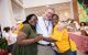Tim Folse, MD (center), was among dozens of faculty and staff attending