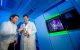 Charalampos “Babis” Kalodimos, PhD, and Liang Tang, PhD, examine a sample.
