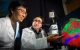 Xinwei Cao, PhD, and Alfonso Lavado discuss a computer image