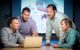 Four St. Jude researchers discuss the high-resolution map of brain development at a table