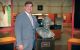 Philip Wenk stands beside a bust of Danny Thomas