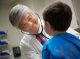 St. Jude patient Warner with doctor