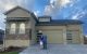 Winners stand outside the St. Jude Dream Home Giveaway in Colorado Springs.