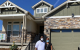 Winners stand outside the St. Jude Dream Home Giveaway in Denver.