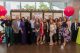 Attendees pose with red balloons at the 2023 Colorado Unites for St. Jude Gala. 