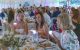 Attendees sit at dining tables and smile at the Colorado Unites for St. Jude Gala. 