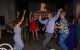 Attendees raise their arms overhead and dance at the Colorado Unites for St. Jude Gala. 
