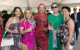 Attendees pose holding champagne flutes at the Colorado Unites for St. Jude Gala. 
