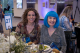 Attendees  pose beside floral sculptures at the Colorado Unites for St. Jude Gala. 