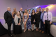 Attendees pose on a St. Jude Hope Garden installation at the Colorado Unites for St. Jude Gala. 