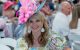 A St. Jude Day at the Derby attendee wears an elaborate Kentucky Derby hat. 