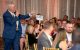 An auctioneer calls out ballot numbers at St. Jude Discover the Dream gala. 