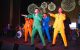 Performers dance on stage at Evening of Hope Los Angeles. 