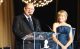 St. Jude Evening of Hope committee chairs Mickey and Lee Segal stand at a podium on stage. 