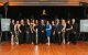Committee members smile on the dancefloor of the 2024 St. Jude Evening with the Stars charity gala. 