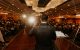 A speaker addresses the crowd from a podium at St. Jude Evening with the Stars charity event. 
