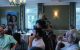 Auctioneer Letitia Frye addresses attendees at the Fairways for Hope charity tournament and live auction in Fort Washington, Pennsylvania. 