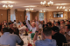 Auctioneer Letitia Frye addresses attendees at the Fairways for Hope charity tournament and live auction in Fort Washington, Pennsylvania. 
