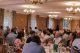 Attendees raise auction numbers at St. Jude Fairways for Hope. 
