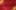 Gold Middle Eastern design over a red background.