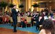 An auctioneer addresses the audience at the 2023 St. Jude Magic Carpet Ride Gala. 