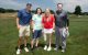 Golfers pose with patient Bridget at the St. Jude New Jersey Golf Classic and Dinner Party.