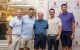 Golfers smile and pose in a group at the New Jersey Golf Classic and Dinner Party. 