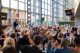 Attendees raise auction ballots at the 2024 St. Jude Pittsburgh Gala at Acrisure Stadium. 