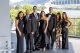 Attendees pose in black tie at the 2024 Pittsburgh Gala at Acrisure Stadium. 