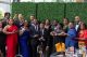 Attendees smile and make hand gestures at the 2024 St. Jude Pittsburgh Gala. 