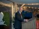 A 2023 St. Jude Gala speaker addresses attendees from the podium. 