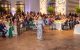 An auctioneer crosses a ballroom floor at the St. Jude Houston Gala. 