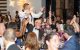 An auctioneer crosses a ballroom floor at the St. Jude Houston Gala. 