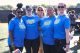 Supporters in matching event T-shirts garther during the St. Jude Walk/Run® in Houston.