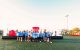 St. Jude Walk/Run supporters pose in front of a large inflatable I Heart St. Jude sign. 