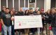 93Q radiothon supporters present a check to St. Jude. 