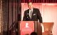 A supporter shares at the podium of Pittsburgh Gala.