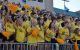 students cheering in stands at Team Up Kansas City event