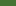 Abstract green pattern resembling the contours of a golf course texture.