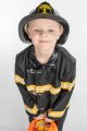 St. Jude patient Alexander dressed up for Halloween as a fireman