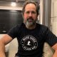 Image of Music Gives artist for St. Jude Ronnie Vanucci wearing the black Music Gives tshirt.