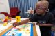St. Jude patient Hayden paints a colorful picture..