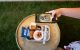 A Dream Chicago attendee photographs food with their phone. 